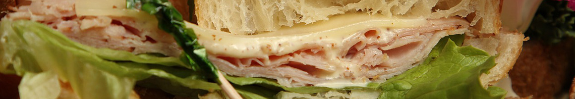 Eating Deli Sandwich at Beach Bagel & Deli restaurant in Lavallette, NJ.
